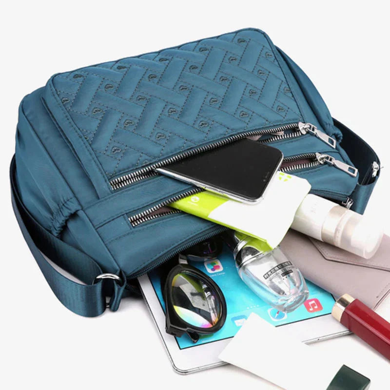 Noora™ | Nylon shoulder bag with messenger style