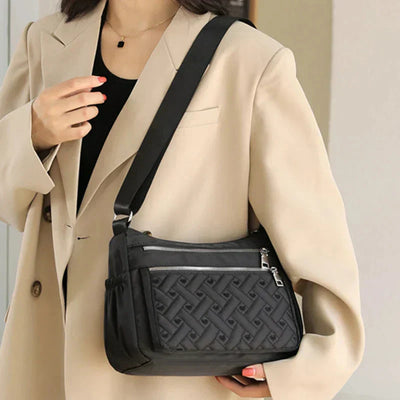 Noora™ | Nylon shoulder bag with messenger style