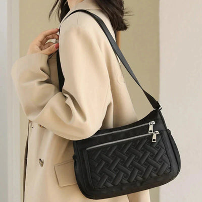 Noora™ | Nylon shoulder bag with messenger style