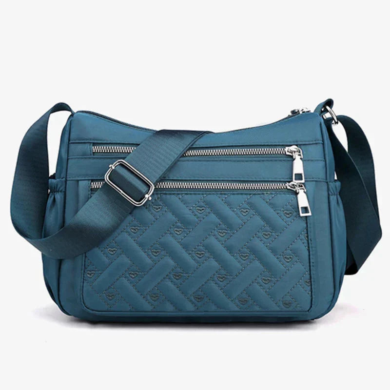 Noora™ | Nylon shoulder bag with messenger style