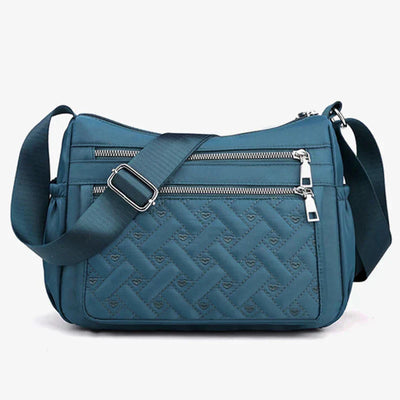 Noora™ | Nylon shoulder bag with messenger style