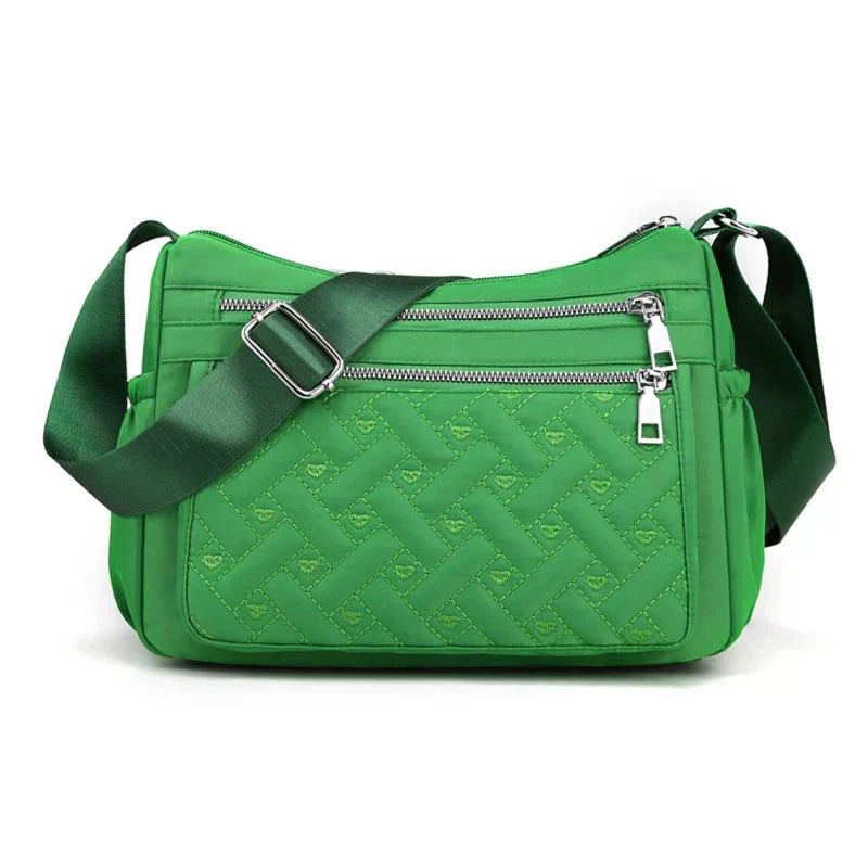 Noora™ | Nylon shoulder bag with messenger style
