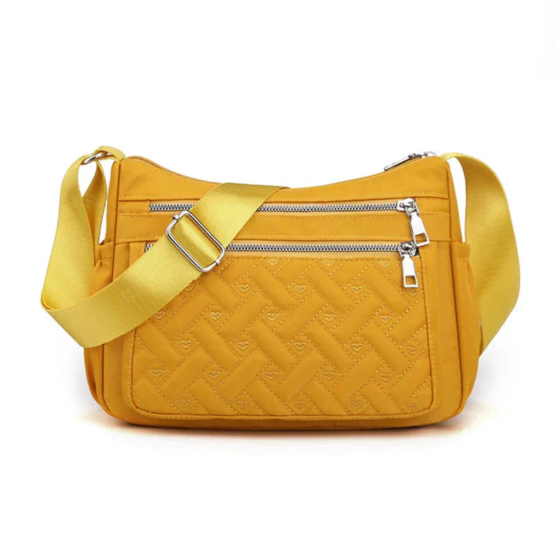 Noora™ | Nylon shoulder bag with messenger style